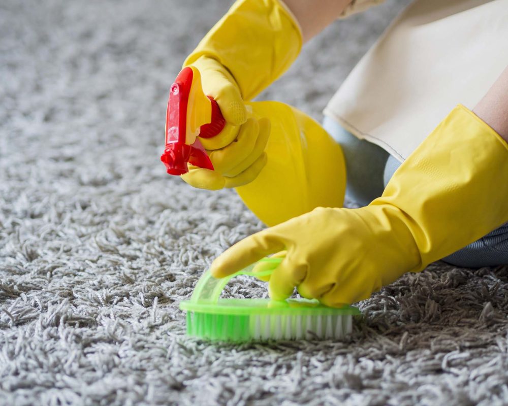 close-up-disinfecting-with-cleaning-supplies